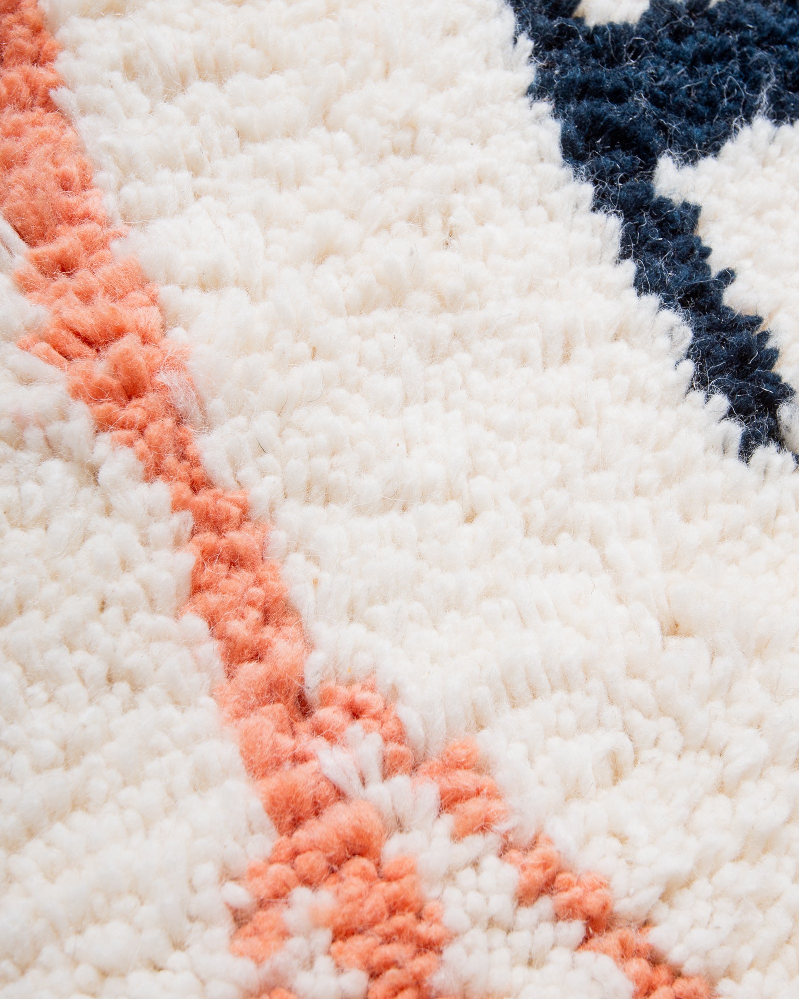 Modern, designer, handcrafted Berber rug from Morocco. Beniourain carpet with beautiful colours and patterns and fluffy wool texture.